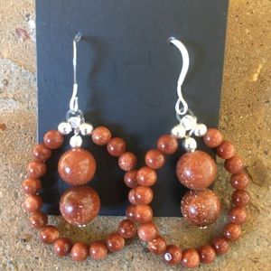 Sterling silver and goldstone earrings
